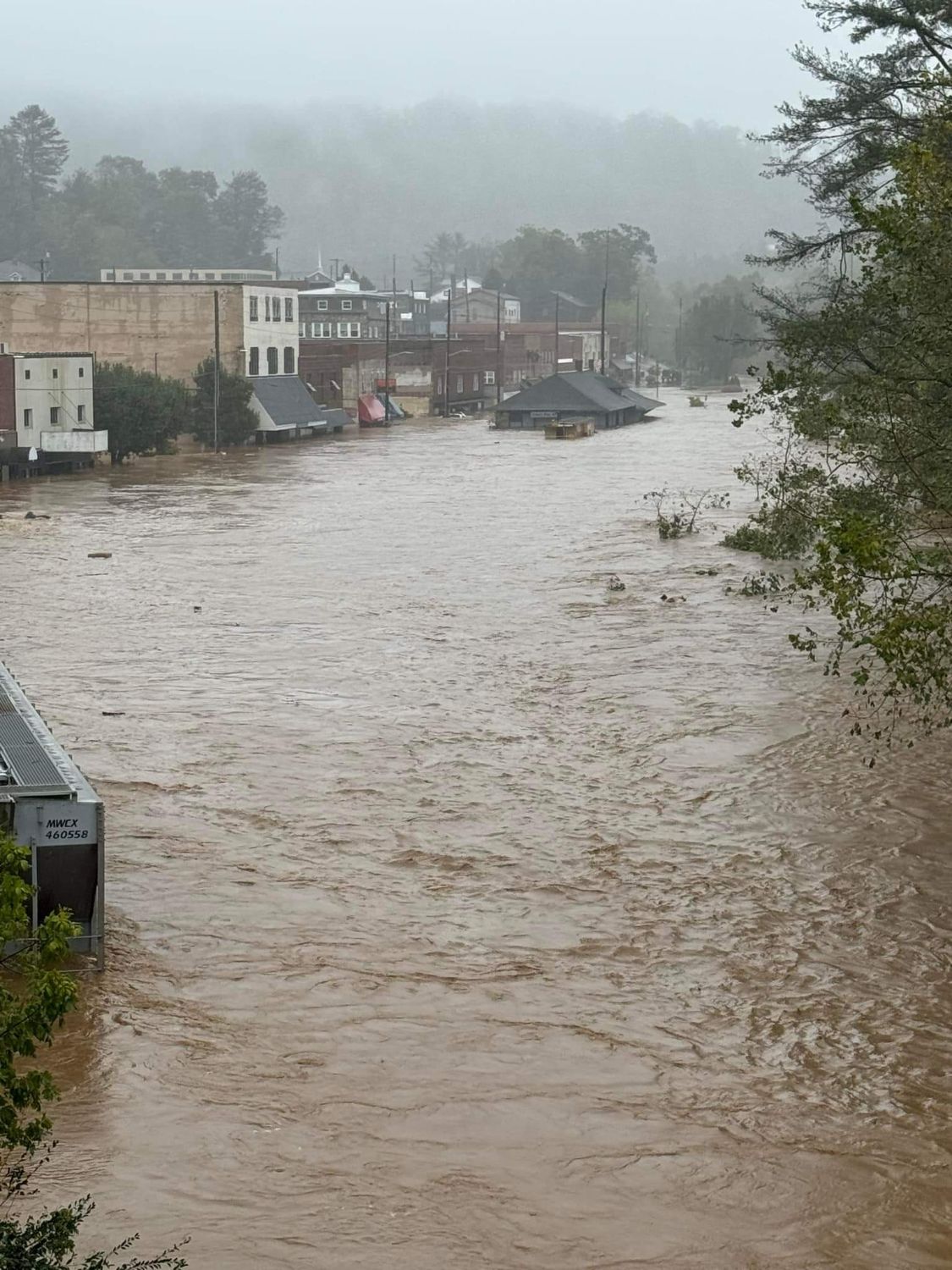 Floodwater from Hurricane Helene rushing through downtown Spruce Pine